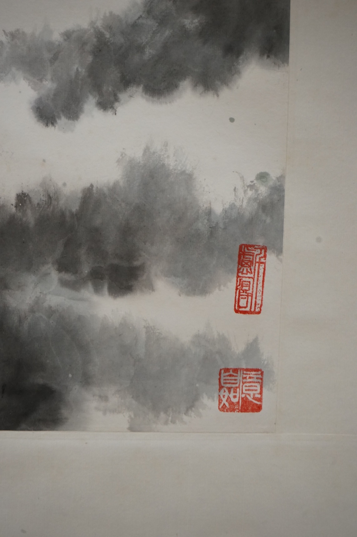A Chinese scroll, hand painted with a mountainous landscape, 82cm wide